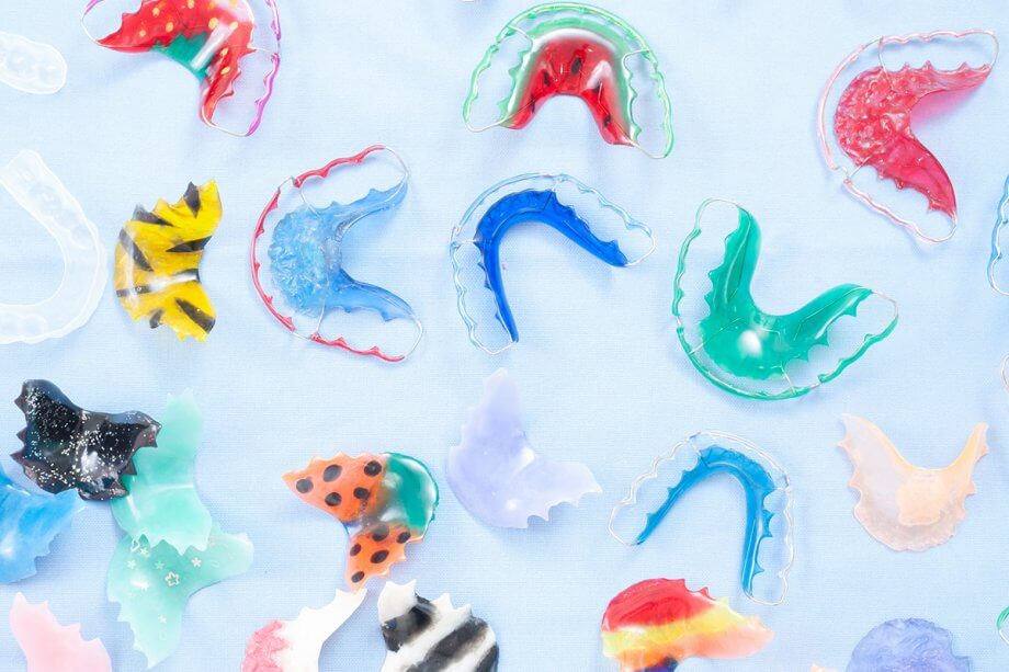 a collection of colorful retainers